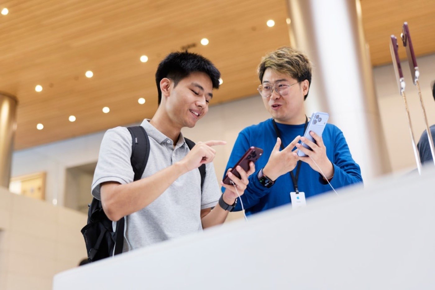 Customer tries iPhone 18 Pro at Apple Jing'an in Shanghai