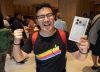 Customer holding silver iPhone 17 Pro at Apple Downtown Detroit from Apple Newsroom