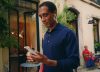 People using iPhone with Apple software updates available artwork